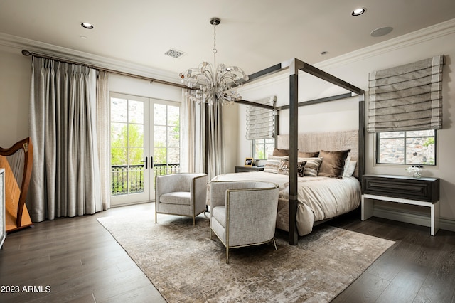 bedroom with a notable chandelier, ornamental molding, dark hardwood / wood-style flooring, and access to exterior