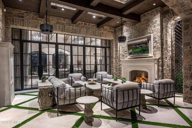 view of patio / terrace featuring an outdoor fireplace