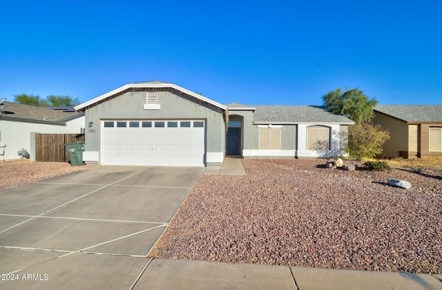 single story home with a garage