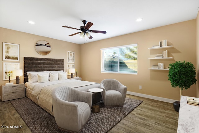 bedroom featuring ceiling fan and dark wood-type flooring