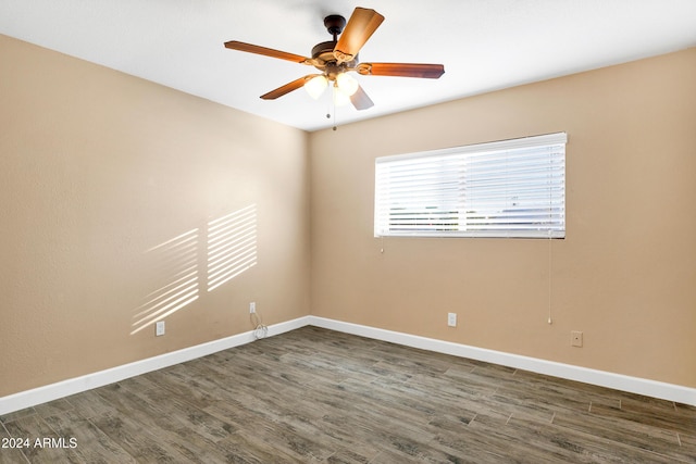 empty room featuring dark wood-type flooring