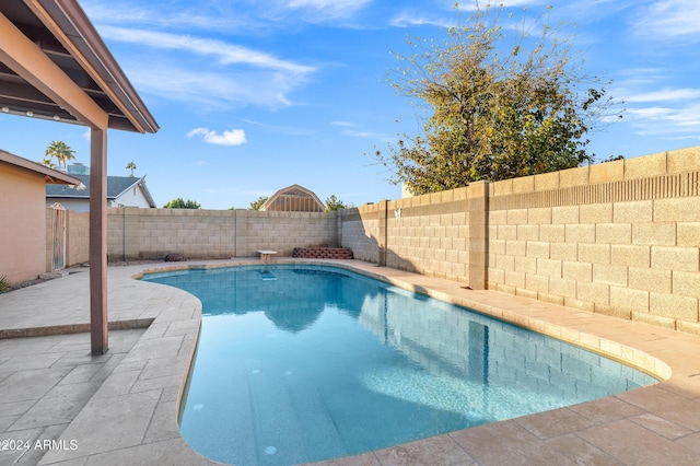 view of swimming pool featuring a patio