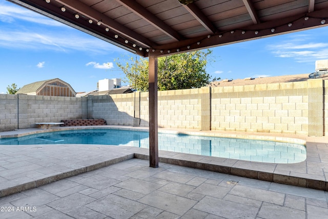 view of pool featuring a patio area