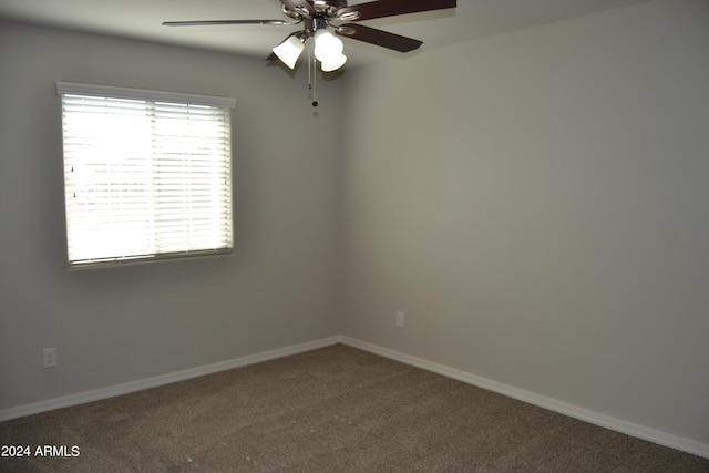 carpeted empty room with ceiling fan