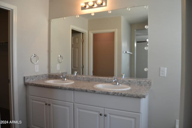 bathroom with double vanity