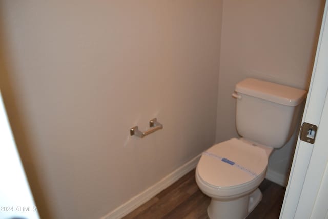 bathroom featuring toilet and hardwood / wood-style floors