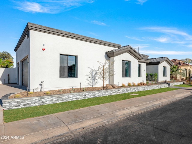 view of front of house with a garage