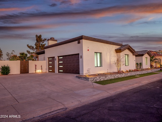 view of front of property featuring a garage