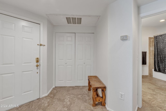 10030 W Indian School Rd Unit 218, Phoenix, AZ 85037 - foyer featuring baseboards