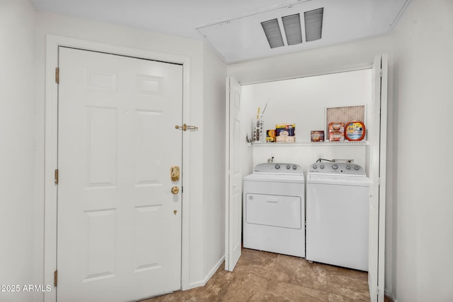 10030 W Indian School Rd Unit 218, Phoenix, AZ 85037 - laundry area with washer and dryer and attic access
