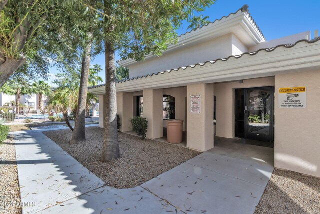 exterior space with stucco siding