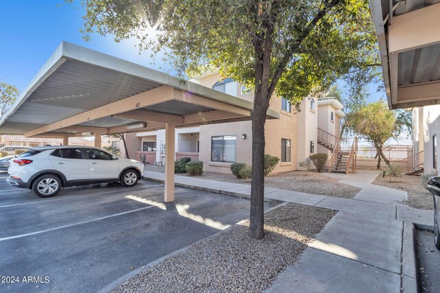 covered parking lot with stairs