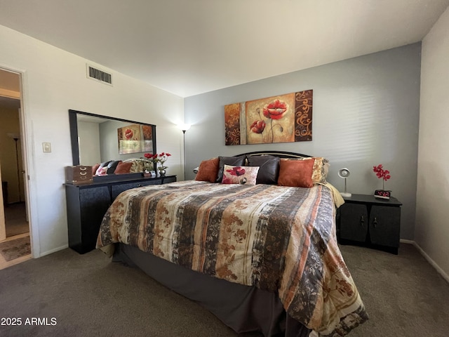 bedroom featuring visible vents, baseboards, and carpet floors