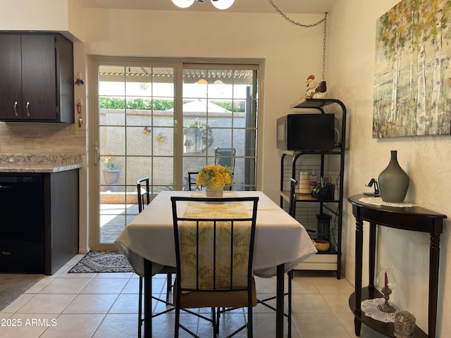 dining room with light tile patterned floors