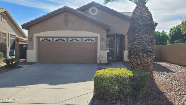 view of front of property featuring a garage