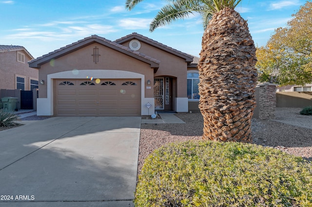 view of front of property featuring a garage