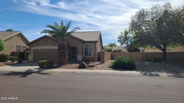 view of front of home featuring a garage