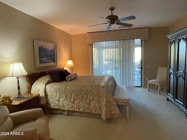 bedroom featuring access to outside, carpet, and ceiling fan