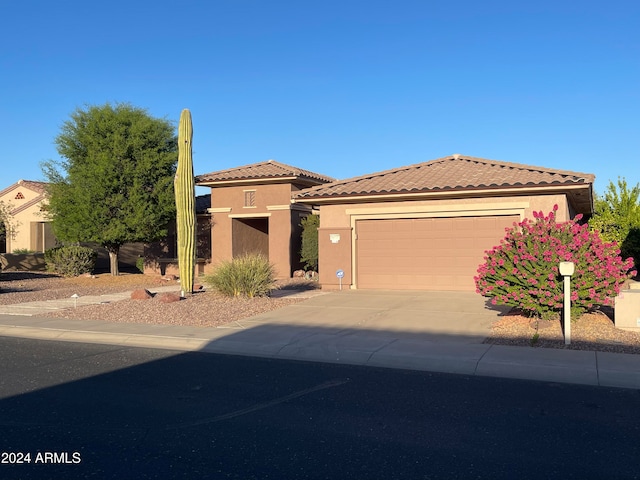 view of front of property featuring a garage