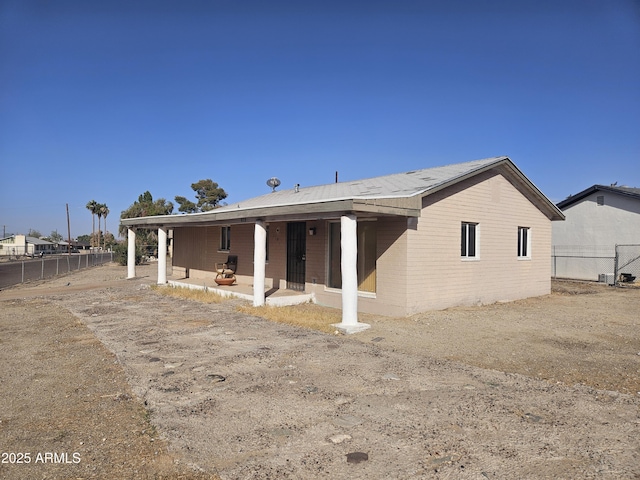 back of house with a patio area