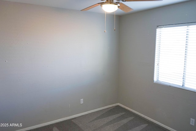 carpeted empty room with ceiling fan