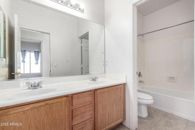 full bathroom with vanity, toilet, tile patterned flooring, and shower / bathing tub combination