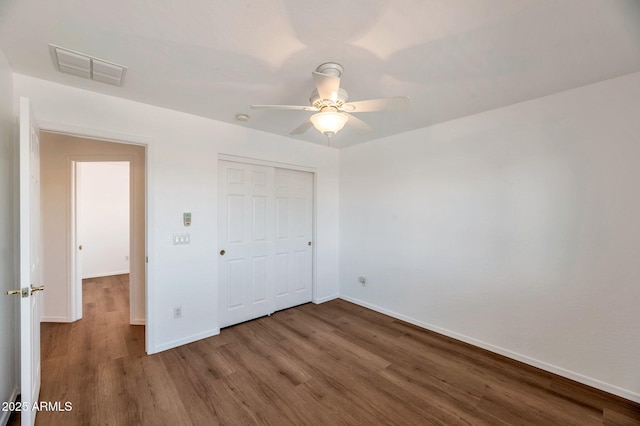 3900 S Velero St, Chandler, AZ 85249 - unfurnished bedroom with ceiling fan, baseboards, wood finished floors, visible vents, and a closet