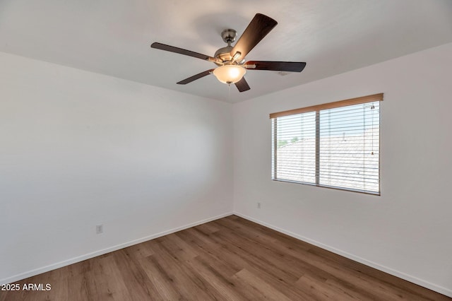 3900 S Velero St, Chandler, AZ 85249 - unfurnished room featuring baseboards, a ceiling fan, and wood finished floors