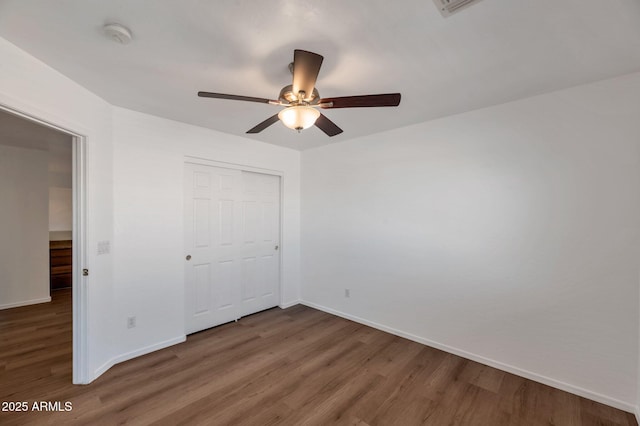 3900 S Velero St, Chandler, AZ 85249 - unfurnished bedroom with baseboards, wood finished floors, and a closet
