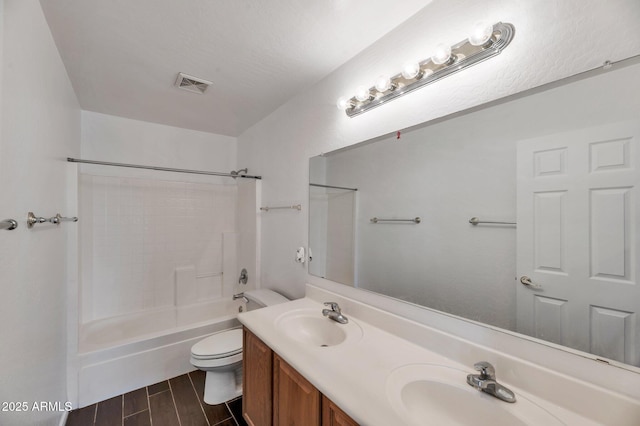 3900 S Velero St, Chandler, AZ 85249 - bathroom with shower / bathtub combination, toilet, visible vents, and a sink