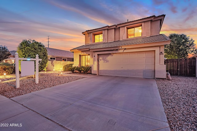3900 S Velero St, Chandler, AZ 85249 - view of front facade featuring fence, a tile roof, a garage, stucco siding, and driveway
