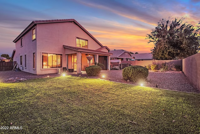 3900 S Velero St, Chandler, AZ 85249 - back of property featuring a fenced backyard, a patio, stucco siding, and a yard