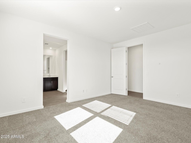 5537 S 246th Ave, Buckeye, AZ 85326 - carpeted spare room with recessed lighting