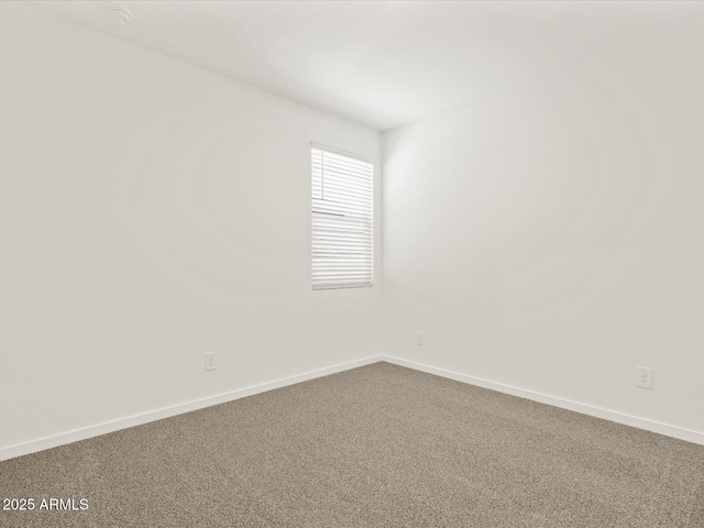 5537 S 246th Ave, Buckeye, AZ 85326 - carpeted empty room featuring baseboards