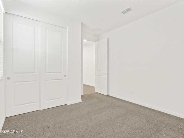 5537 S 246th Ave, Buckeye, AZ 85326 - unfurnished bedroom featuring carpet flooring and a closet