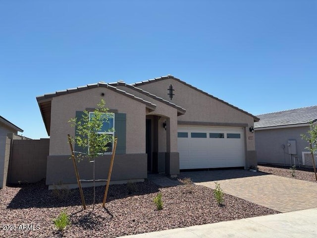 5537 S 246th Ave, Buckeye, AZ 85326 - single story home featuring an attached garage, decorative driveway, stucco siding, and a tile roof