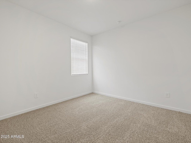 5537 S 246th Ave, Buckeye, AZ 85326 - empty room featuring baseboards and light colored carpet