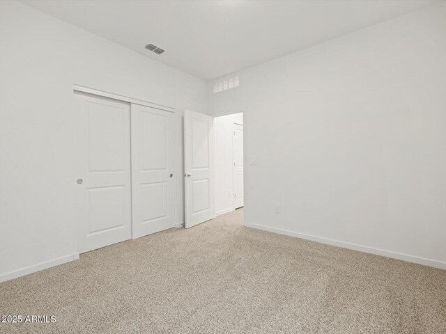 5537 S 246th Ave, Buckeye, AZ 85326 - unfurnished bedroom featuring carpet flooring and a closet