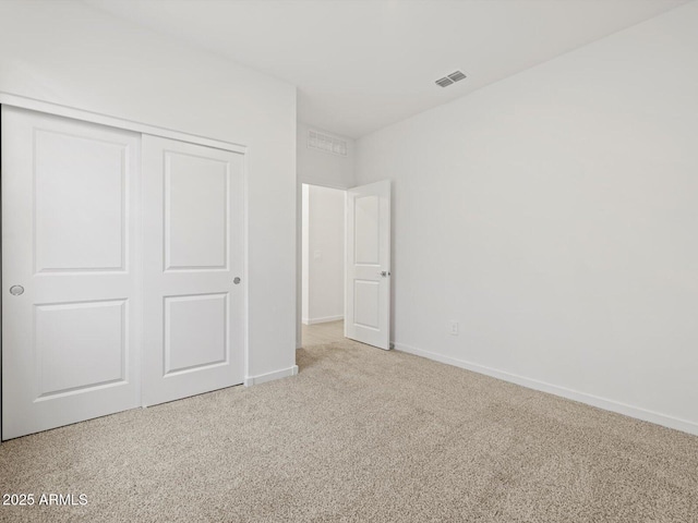 5537 S 246th Ave, Buckeye, AZ 85326 - unfurnished bedroom featuring carpet floors and a closet