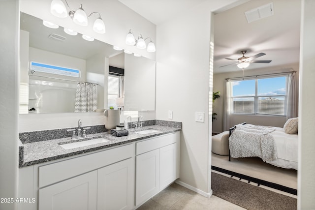 ensuite bathroom featuring double vanity, ensuite bath, a sink, and visible vents