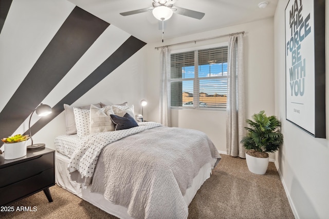 bedroom with a ceiling fan, baseboards, and carpet flooring