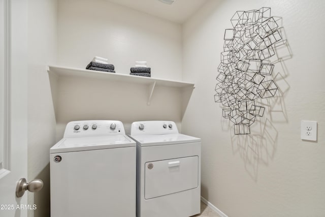laundry area featuring laundry area and separate washer and dryer