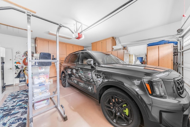 garage featuring a garage door opener