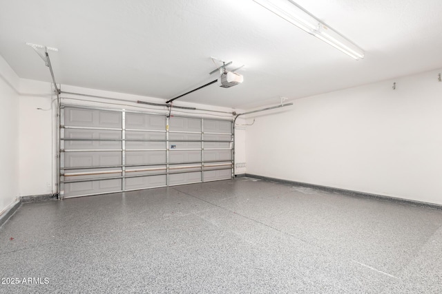 3444 E Flamingo Ct, Gilbert, AZ 85297 - garage with a garage door opener and baseboards