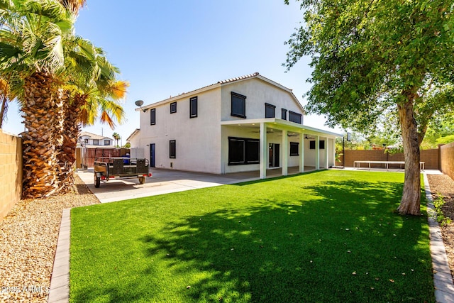 3444 E Flamingo Ct, Gilbert, AZ 85297 - rear view of house with ceiling fan, a patio, a fenced backyard, and stucco siding