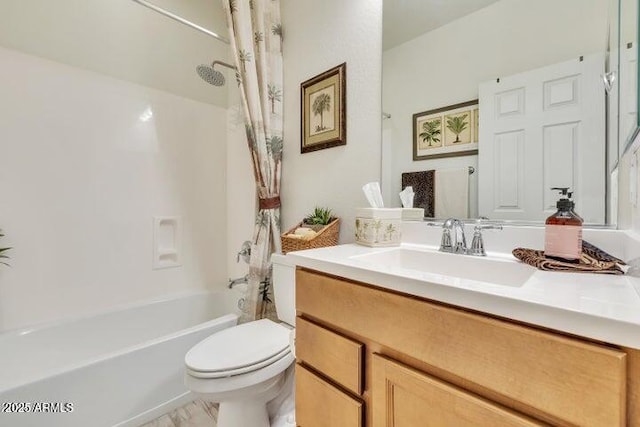 full bathroom with toilet, vanity, and shower / tub combo with curtain