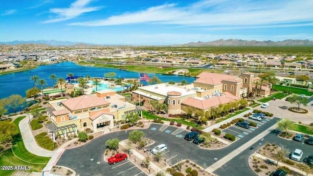 aerial view featuring a water and mountain view