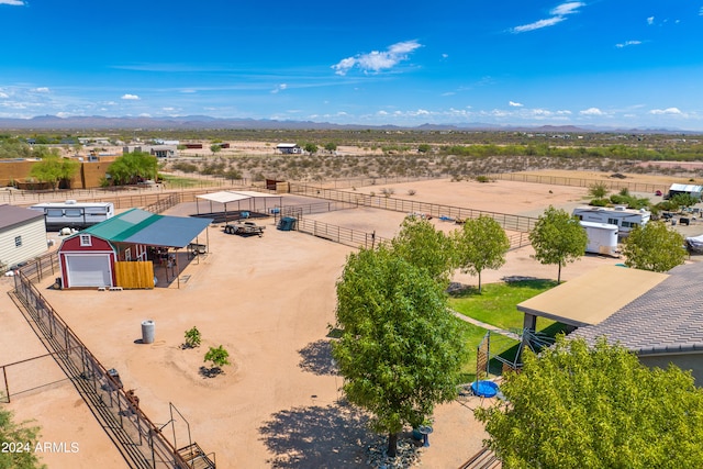 birds eye view of property featuring a rural view