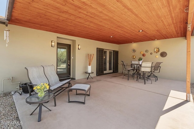 view of patio featuring outdoor dining area