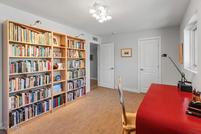 office space featuring carpet floors and baseboards